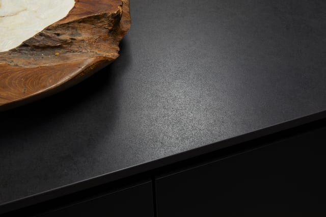 Detail of the dark, textured Dekton worktop at Eltham.