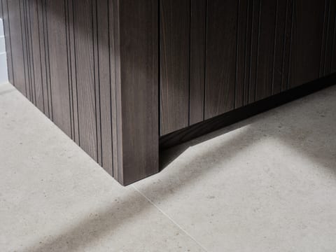 Leicht Bahia routed dark-timber cabinetry with light bronze detailing at the Keston Dark Timber & Gaggenau Kitchen.